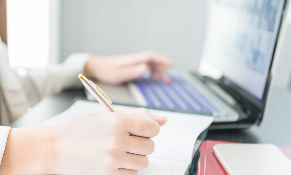 hand-working-on-laptop